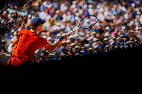 Jannik Sinner plays a shot against Grigor Dimitrov 
